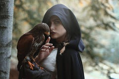 Mysterious woman with hawk royalty free stock images Mysterious woman with hawk royalty free stock images