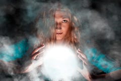 Mysterious woman making some magic royalty free stock photo Mysterious woman making some magic royalty free stock photo