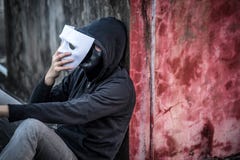 Mystery man taking of the mask showing another mask under it royalty free stock photos Mystery man taking of the mask showing another mask under it royalty free stock photos