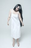 Mystical ghost woman in white long shirt royalty free stock photography Mystical ghost woman in white long shirt royalty free stock photography