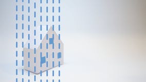 A mão de um segurador protege uma casa de papel das catástrofes naturais imagem de stock A mão de um segurador protege uma casa de papel das catástrofes naturais imagem de stock