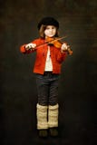 Mädchen, welches die Violine übt stockfotografie Mädchen, welches die Violine übt stockfotografie