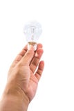 Männliche Hand, die Glühlampe II hält lizenzfreies stockbild Männliche Hand, die Glühlampe II hält lizenzfreies stockbild