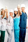 Médicos sonrientes Aislado sobre el fondo blanco imágenes de archivo libres de regalías Médicos sonrientes Aislado sobre el fondo blanco imágenes de archivo libres de regalías
