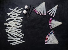 Nail art samples on the black table. Top view. royalty free stock photo Nail art samples on the black table. Top view. royalty free stock photo
