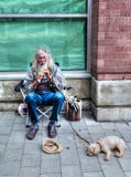 Elderly Homeless Man Basking on the Streets of Nainamo