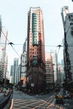 Narożnikowy budynek biurowy na ulicach Hong Kong wyspa zdjęcie stock Narożnikowy budynek biurowy na ulicach Hong Kong wyspa zdjęcie stock