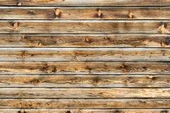 Natural brown barn wood wall. Wooden textured background pattern. royalty free stock image Natural brown barn wood wall. Wooden textured background pattern. royalty free stock image