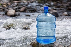 Natural drinking water in a large bottle. Natural mineral water in a large bottle Stock Images Natural drinking water in a large bottle. Natural mineral water in a large bottle Stock Images