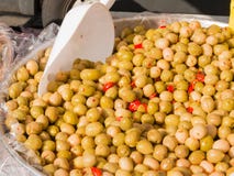 Natural green olives with red peppers stock photos Natural green olives with red peppers stock photos