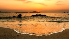 Nature Seascape With Tranquil Beach, Rocks, Islands And The Wave At Gorgeous Orange Sunrise Royalty Free Stock Photography Nature Seascape With Tranquil Beach, Rocks, Islands And The Wave At Gorgeous Orange Sunrise Royalty Free Stock Photography