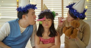 Naughty daughter ignoring father and mother in the party at home. stock video footage Naughty daughter ignoring father and mother in the party at home. stock video footage