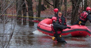 Nautical rescue team evacuated a victim with inflatable boat. In daylight condition Nautical rescue team evacuated a victim with inflatable boat. In daylight condition