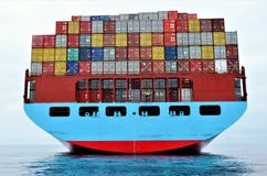 Navire porte-conteneurs ? l'ancre, attendant pour entrer dans le port images libres de droits Navire porte-conteneurs ? l'ancre, attendant pour entrer dans le port images libres de droits
