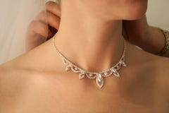 Necklace On A Neck At The Bride. Royalty Free Stock Photography