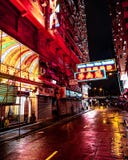 Neon lights in rainy hongkong streets at night royalty free stock photo Neon lights in rainy hongkong streets at night royalty free stock photo