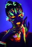 Neon make up art glowing painting