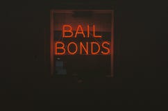 A neon sign that reads �Bail Bonds� stock images A neon sign that reads �Bail Bonds� stock images