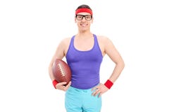Nerdy guy holding a football royalty free stock image Nerdy guy holding a football royalty free stock image