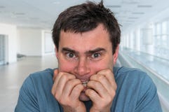 Nervous man biting his nails - nervous breakdown stock images Nervous man biting his nails - nervous breakdown stock images