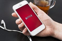Netflix. HILVERSUM, NETHERLANDS - JANUARY 08, 2014: Netflix Inc. is an American provider of on-demand Internet streaming media available to ever more countries Netflix. HILVERSUM, NETHERLANDS - JANUARY 08, 2014: Netflix Inc. is an American provider of on-demand Internet streaming media available to ever more countries