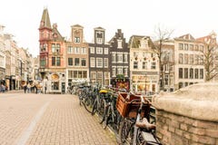 The Netherlands, Amsterdam - December 19, 2018: amsterdam street with parked bikes royalty free stock photography The Netherlands, Amsterdam - December 19, 2018: amsterdam street with parked bikes royalty free stock photography