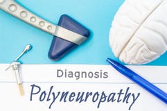 Neurological diagnosis of Polyneuropathy. Neurological hammer, human brain figure, tools for sensitivity testing are next to title royalty free stock photo Neurological diagnosis of Polyneuropathy. Neurological hammer, human brain figure, tools for sensitivity testing are next to title royalty free stock photo