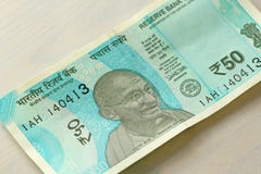 A new banknote of India with a denomination of 50 rupees. Indian stock photo A new banknote of India with a denomination of 50 rupees. Indian stock photo