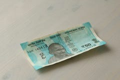 A new banknote of India with a denomination of 50 rupees. Indian stock photography A new banknote of India with a denomination of 50 rupees. Indian stock photography