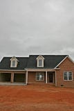 New Brick Home Under Construction - Vertical Royalty Free Stock Photos