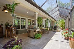 New Home Mid Range Luxury Patio Covered Exterior Outdoors Daytime Bright Sunny Warm Day Furniture Design House royalty free stock image New Home Mid Range Luxury Patio Covered Exterior Outdoors Daytime Bright Sunny Warm Day Furniture Design House royalty free stock image