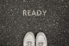 New Life Concept, Motivational Slogan with Word READY on the ground of asphalt stock images New Life Concept, Motivational Slogan with Word READY on the ground of asphalt stock images