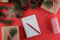 New Year. Christmas. Holidays. Composition with New Year and Christmas gifts and the New Year`s resolution form. stock photos New Year. Christmas. Holidays. Composition with New Year and Christmas gifts and the New Year`s resolution form. stock photos