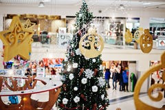 New Year decorations in shopping mall with Christmas tree