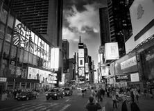 NEW YORK CITY, MANHATTAN, APR,24, 2015: Balck and white NYC Times Square lights screens buildings fashion boutiques led billboards Royalty Free Stock Photo NEW YORK CITY, MANHATTAN, APR,24, 2015: Balck and white NYC Times Square lights screens buildings fashion boutiques led billboards Royalty Free Stock Photo
