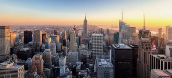 New York City. Manhattan downtown skyline with illuminated Empire State Building and skyscrapers at sunset. royalty free stock photos New York City. Manhattan downtown skyline with illuminated Empire State Building and skyscrapers at sunset. royalty free stock photos