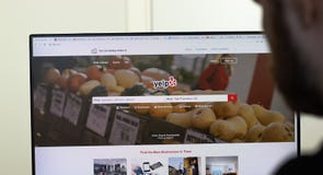 New York, USA - 26 April 2021: Yelp website page on screen, man using service, Illustrative Editorial