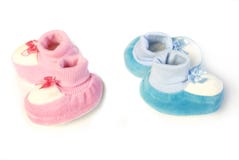 Пинк и голубые newborn ботинки стоковое фото rf Пинк и голубые newborn ботинки стоковое фото rf