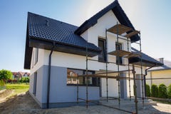 Newly built house with a finished plaster royalty free stock photo Newly built house with a finished plaster royalty free stock photo