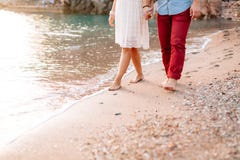 Newlyweds on the beach. Legs close-up royalty free stock photo Newlyweds on the beach. Legs close-up royalty free stock photo