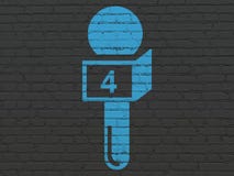 News concept: Microphone on wall background royalty free stock photography News concept: Microphone on wall background royalty free stock photography