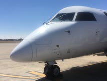 Nez et habitacle de South African Express de Havilland photo stock Nez et habitacle de South African Express de Havilland photo stock