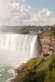 Niagara Falls Side View with People in Yellow Suits stock image Niagara Falls Side View with People in Yellow Suits stock image