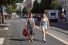 NICE, FRANCE - july 14, 2017: Tourists and local people walking on the charming vintage streets of Old town in Nice Royalty Free Stock Image NICE, FRANCE - july 14, 2017: Tourists and local people walking on the charming vintage streets of Old town in Nice Royalty Free Stock Image