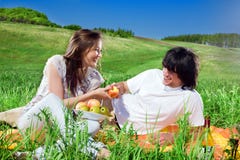 Nice Girl With Fruit And Boy With Smile Royalty Free Stock Photos