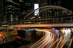 Night city view of cars under modern bridge in downtown at night stock photos Night city view of cars under modern bridge in downtown at night stock photos