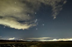 Night Sky Stars Orion Constellation And Clouds Nightscape Stock Image