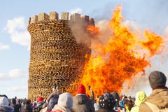 Nikola-Lenivets - March 9, 2019: Pancake week. Burning of the fortress of the Bastille royalty free stock image Nikola-Lenivets - March 9, 2019: Pancake week. Burning of the fortress of the Bastille royalty free stock image