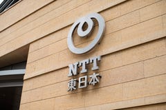 Nippon τηλέγραφος και τηλέφωνο - NTT το λογότυπο, αυτό είναι μια ιαπωνική επιχείρηση τηλεπικοινωνιών με κεντρικά γραφεία στο Τόκι στοκ φωτογραφίες με δικαίωμα ελεύθερης χρήσης Nippon τηλέγραφος και τηλέφωνο - NTT το λογότυπο, αυτό είναι μια ιαπωνική επιχείρηση τηλεπικοινωνιών με κεντρικά γραφεία στο Τόκι στοκ φωτογραφίες με δικαίωμα ελεύθερης χρήσης