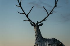 Nizhny Novgorod, Russia July 25, 2017: metal sculpture of a deer on the embankment. The symbol of the city Stock Images Nizhny Novgorod, Russia July 25, 2017: metal sculpture of a deer on the embankment. The symbol of the city Stock Images